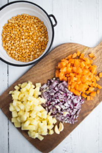 chopped vegetables on a wooden board