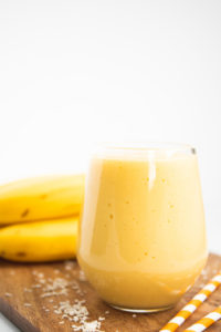 coconut mango smoothie in a glass