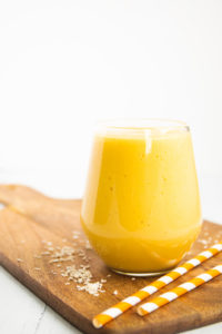 coconut mango smoothie in a glass